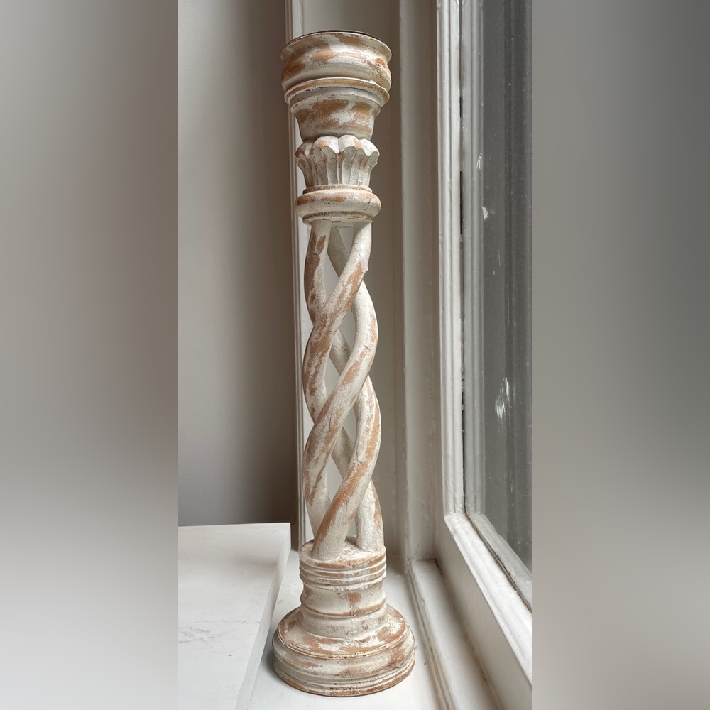 Pair of carved wooden candlesticks